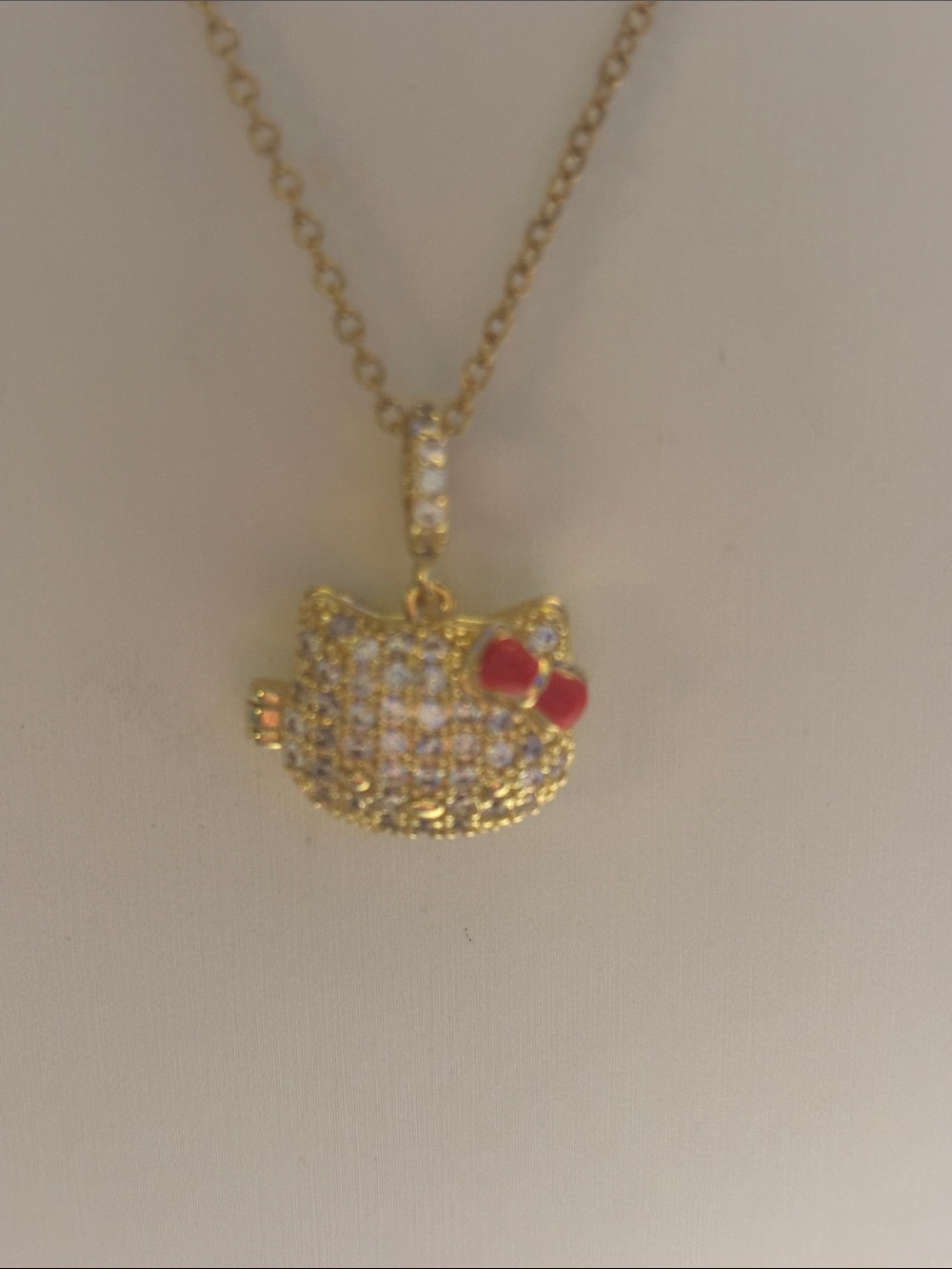 Hello Kitty Gold Pendant Necklace with Red Bow and Crystal Accents locket
